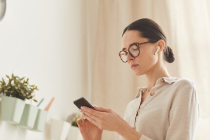 Elegant Adult Woman Using Smartphone