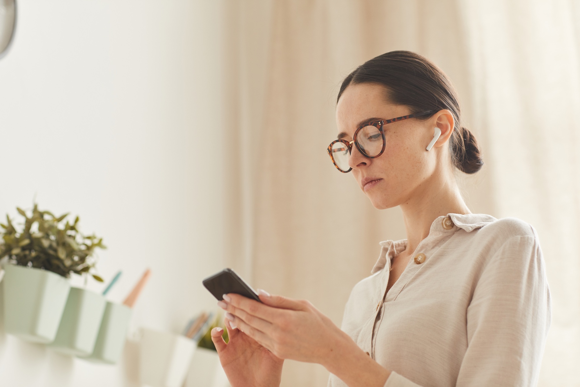 Elegant Adult Woman Using Smartphone